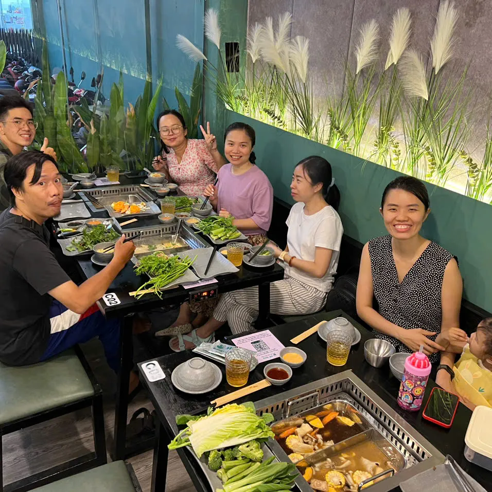 Friends gathered around a shared dinner.
